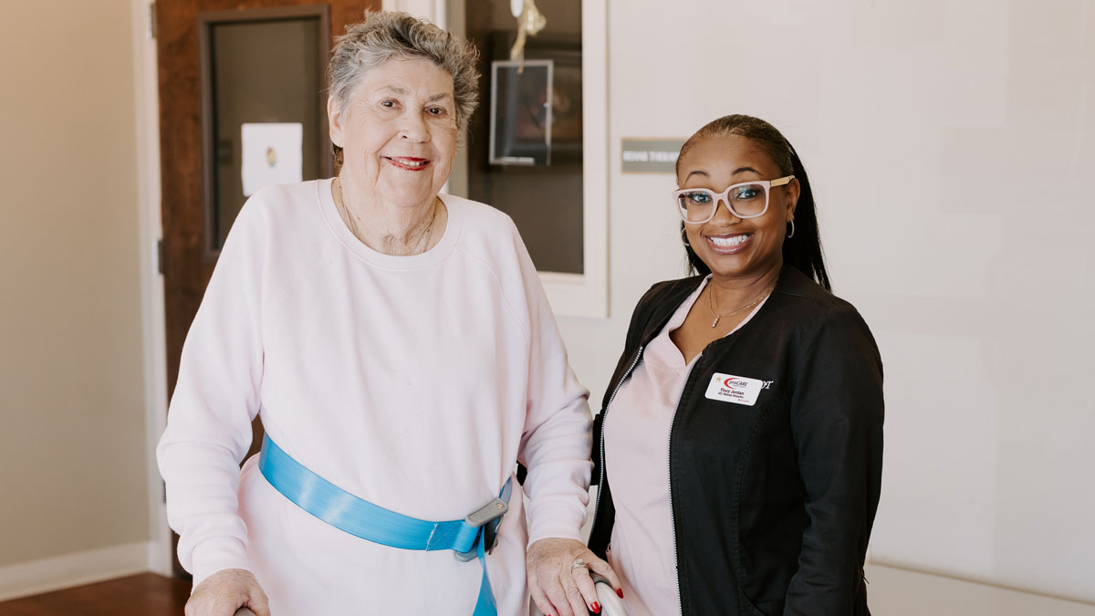 Staff Member assisting patient at Belle View Estates Rehabilitation and Care Center